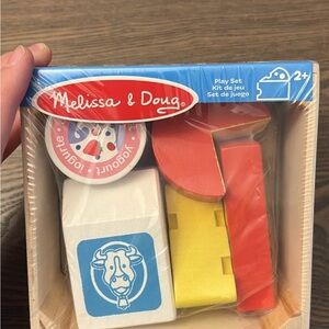 Melissa & Doug Red, Yellow, and Blue Wooden Block Set